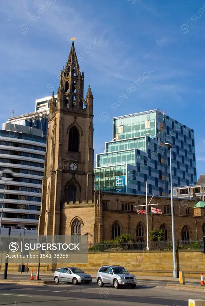 Church with office buildings in city, Liverpool, Merseyside, North West England, England