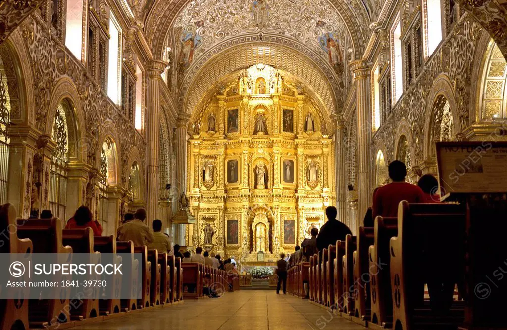 People in cathedral, Santo Domingo Church, Oaxaca, Mexico