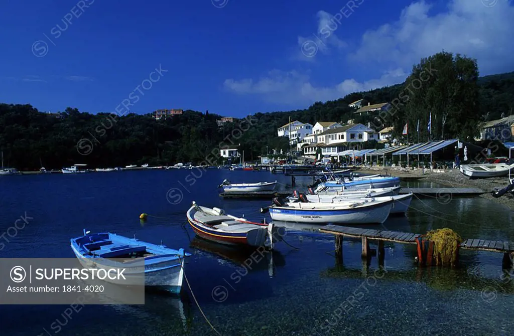 Boats moored at harbor, Agios stefanos, Attica, Greece