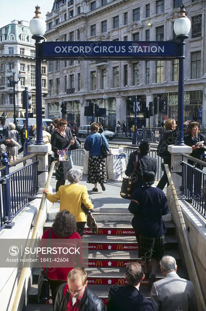 People at entrance of subway station, Oxford Circus, London, England
