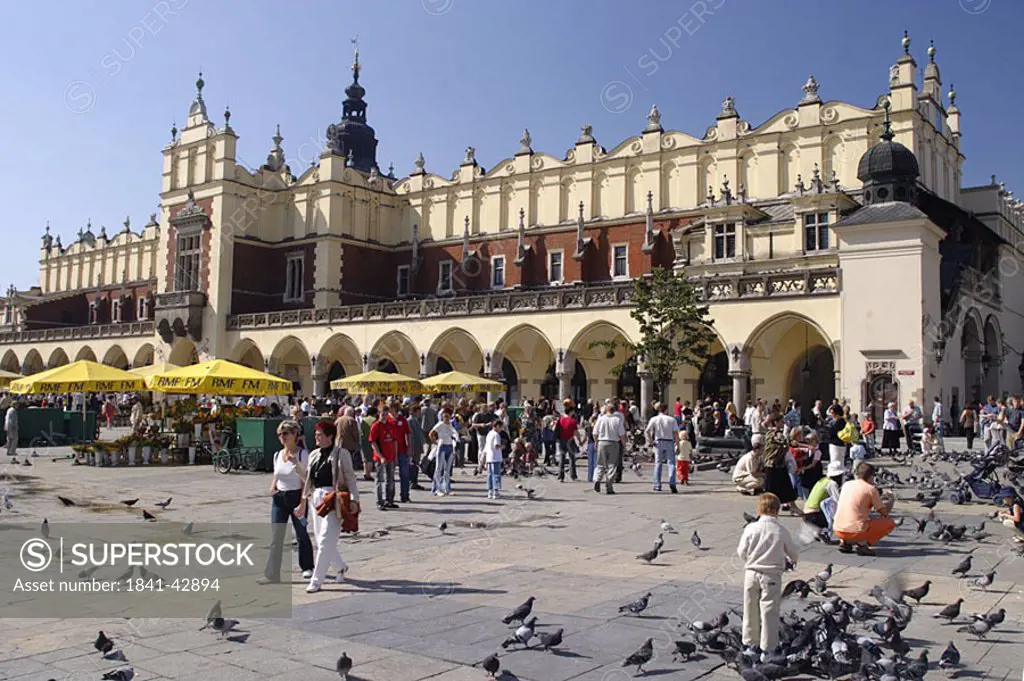 People at market stall, Krakow, Poland