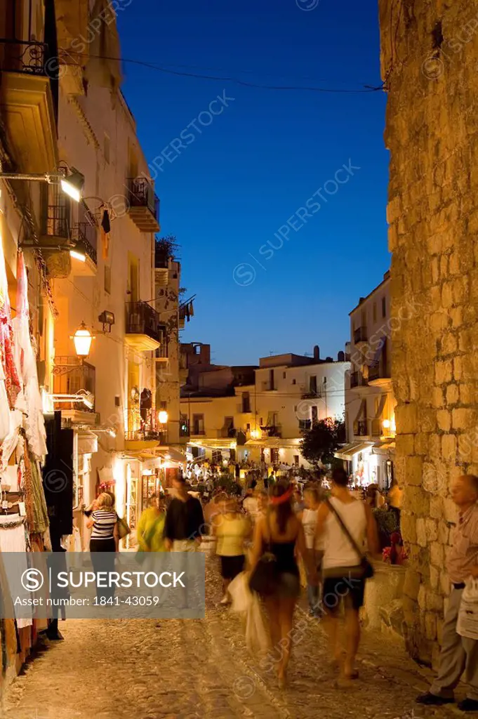 Pedestrians in the old town of Ibiza City, Ibiza, Spain