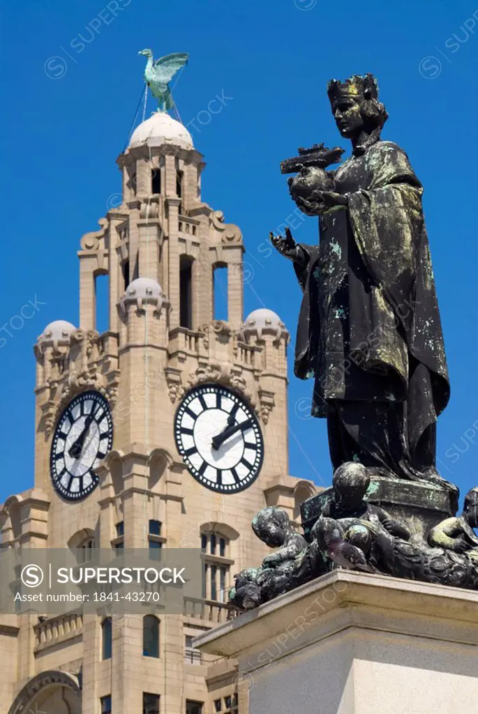 Statue in front of tower, Royal Liver Building, Port Of Liverpool Building, Liverpool, Merseyside, North West England, England