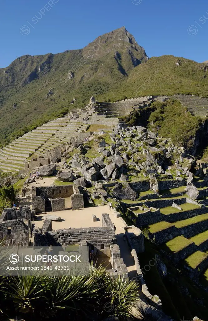 High angle view of old ruins on mountain, Inca Ruins, Machu Picchu, Cusco Region, Peru