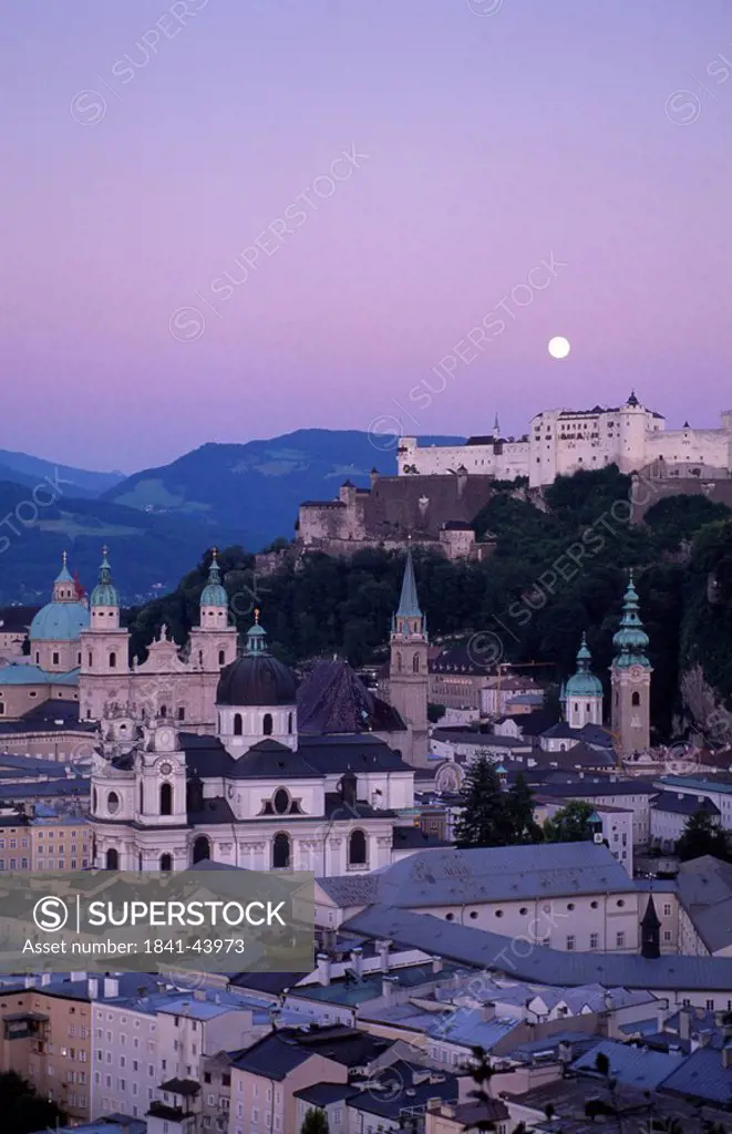 Town with castle in background, Burg Hohenwerfen Castle, Salzburg, Austria