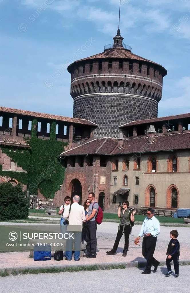 Group of tourists standing in front of building, Lombardia, Milano, Italy, Europe