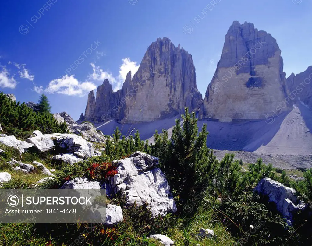 Rock formations on landscape, Tre Cime di Lavaredo, Dolomites, Italy