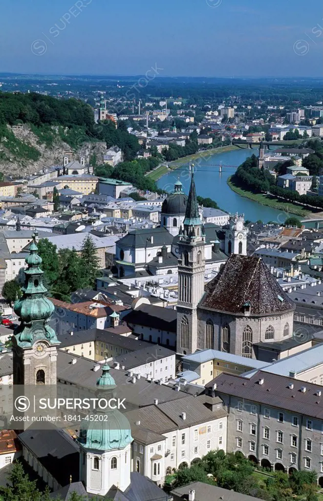 High angle view of buildings in town, Salzach River, Salzburg, Austria