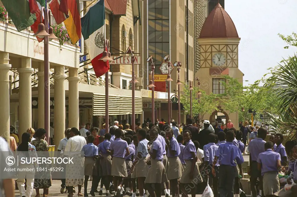 Group of school children in front of clock tower, Namibia