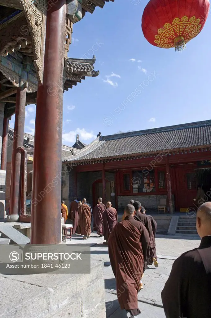 Monks in monastery, Tayuan Temple, Wutai Shan, Shaanxi Province, China