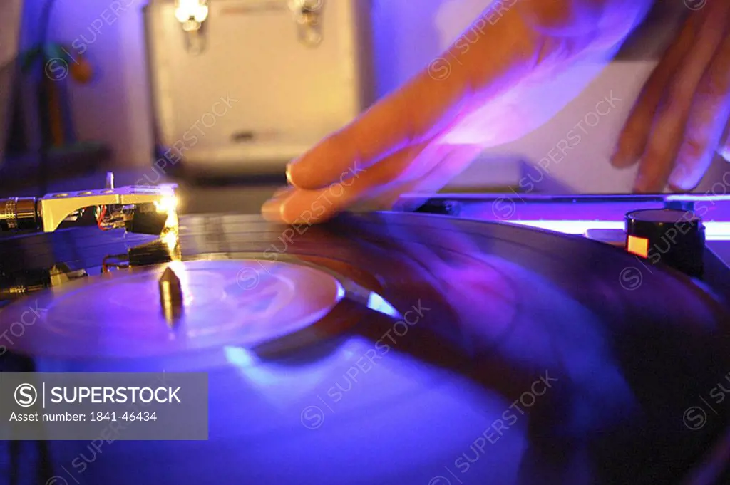 Close_up of DJ´s hand on turntable