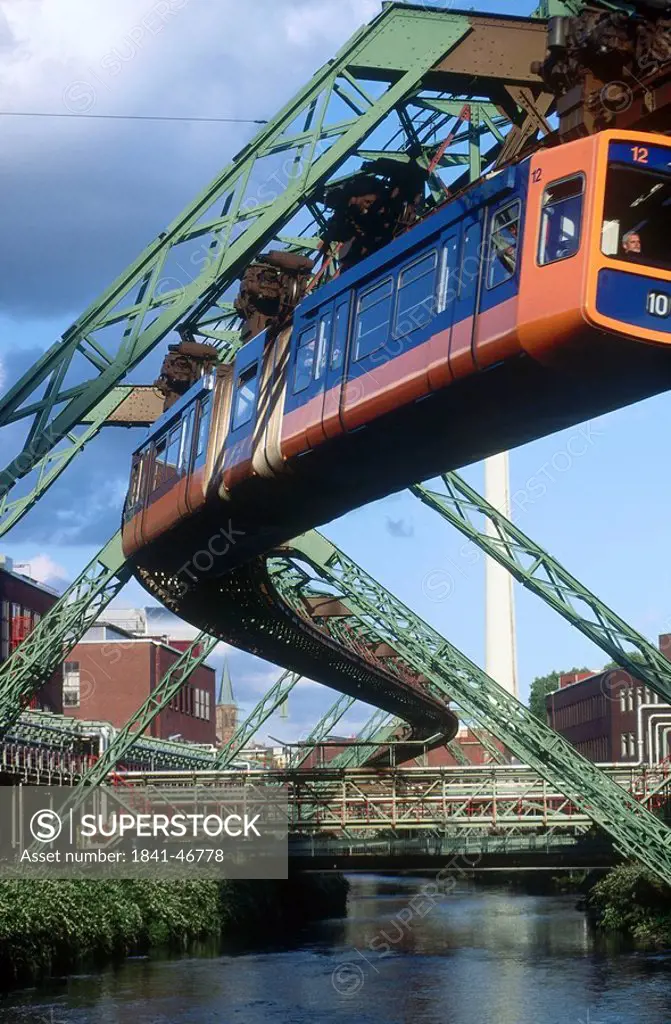 Suspension monorail over bridge, Wuppertal Schwebebahn, River Wupper, Wuppertal, North Rhine_Westphalia, Germany
