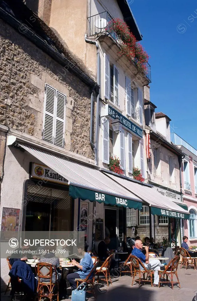 Tourists at outdoor cafe, Avallon, Burgundy, France