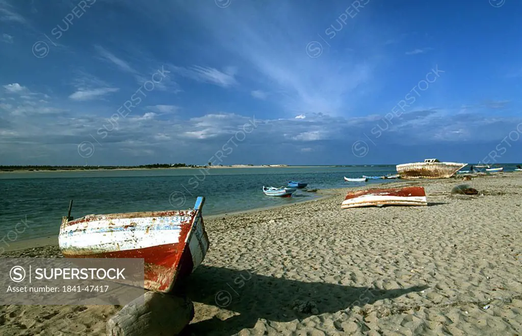 Boats moored on beach, Djerba, Tunisia