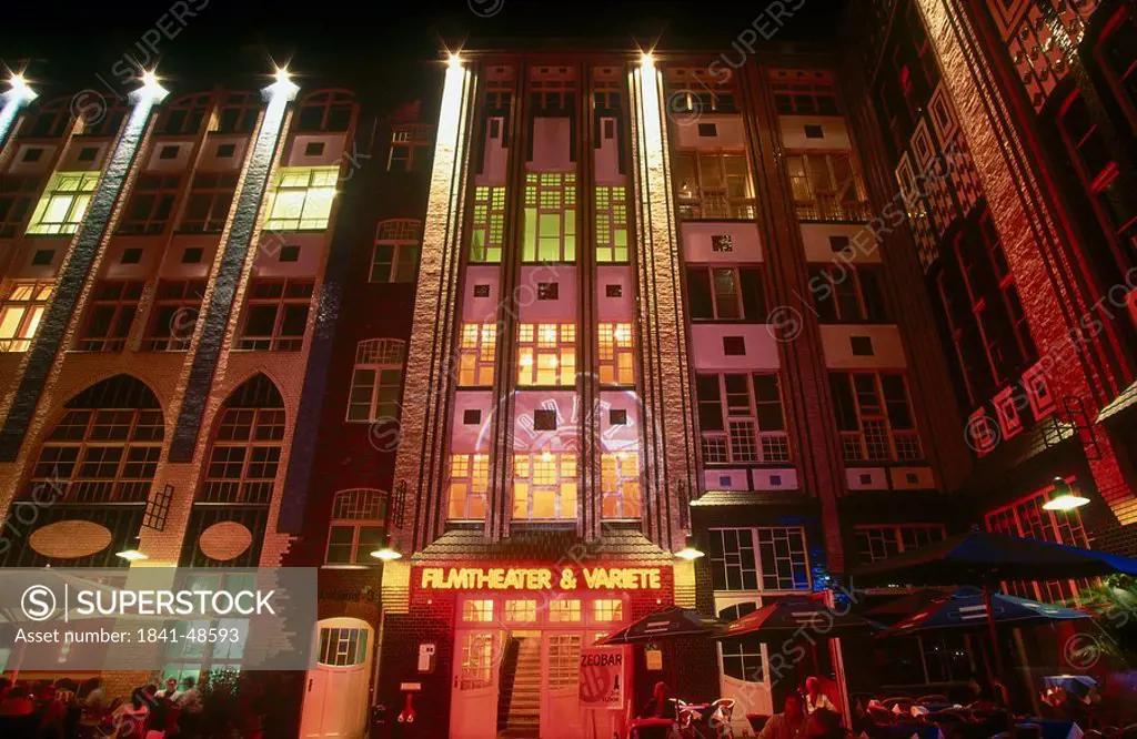 Low angle view of building illuminated at night, Berlin, Germany, Europe