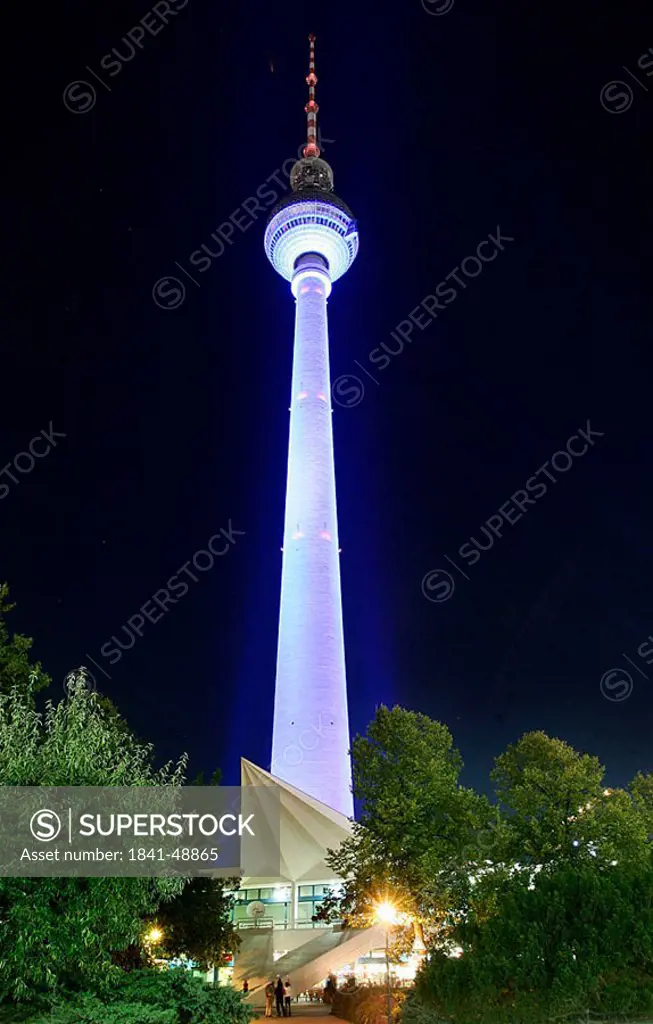 Television tower lit up at night, Alexanderplatz, Berlin, Germany