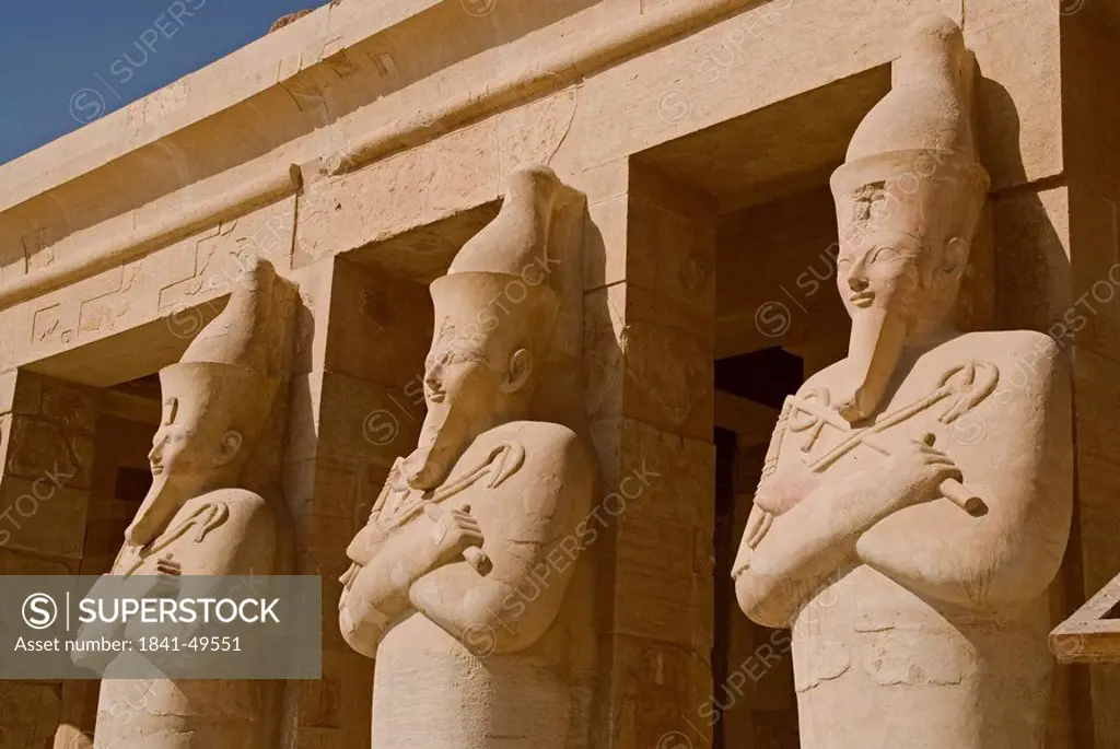 Statues at the pillars of the Temple of Hatshepsut, Luxor, Egypt
