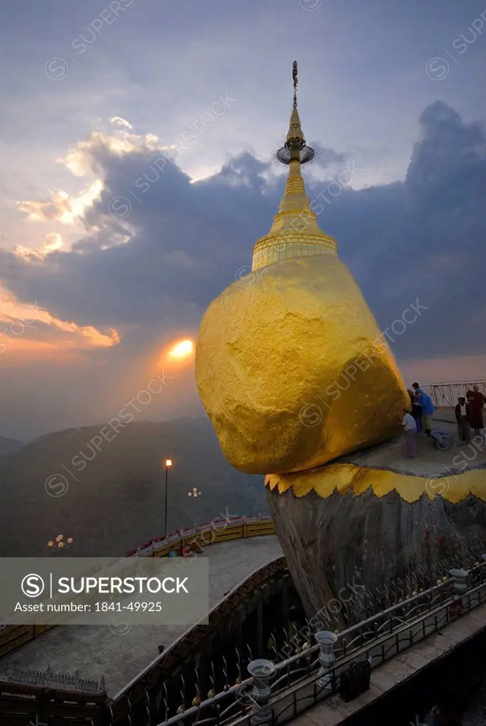 Pilgrims near pagoda on golden rock, Kyaiktiyo Pagoda, Mon State, Myanmar