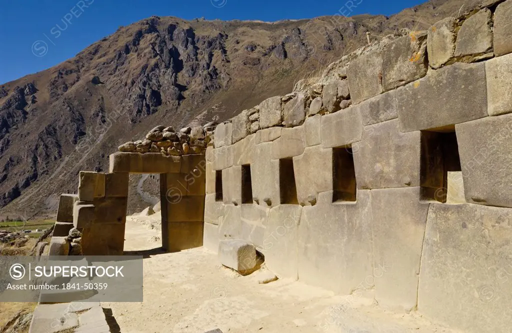 Old ruins in valley, Ollantaytambo, Urubamba Province, Cusco Region, Peru
