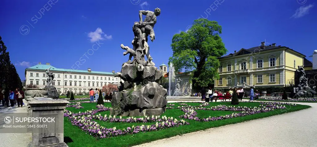 Statue in garden in front of castle, Mirabell Palace, Salzburg, Austria