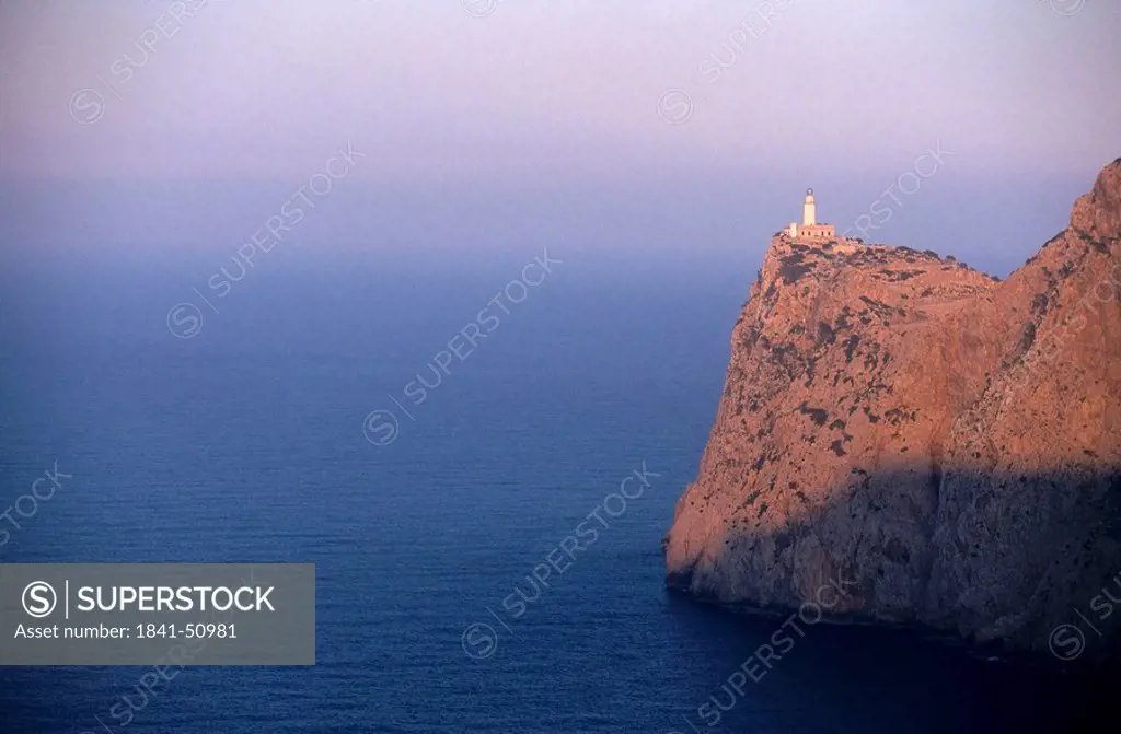 Lighthouse on the edge of a cliff