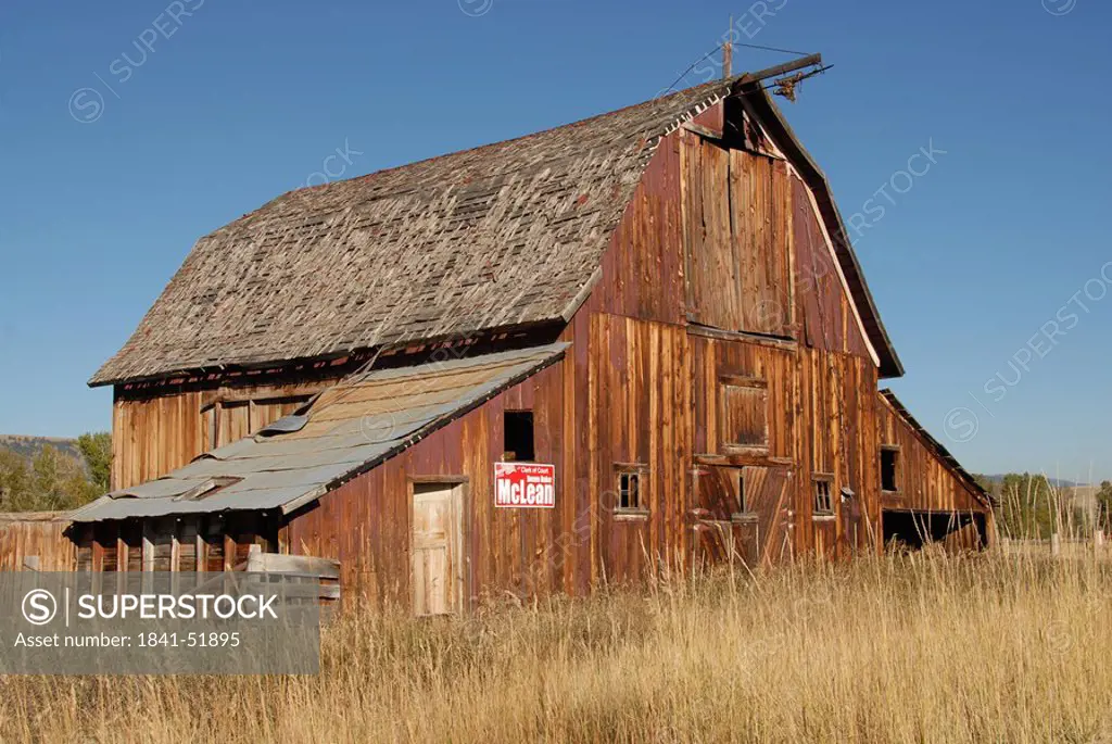 Timber house in field, Philipsburg, Montana, USA