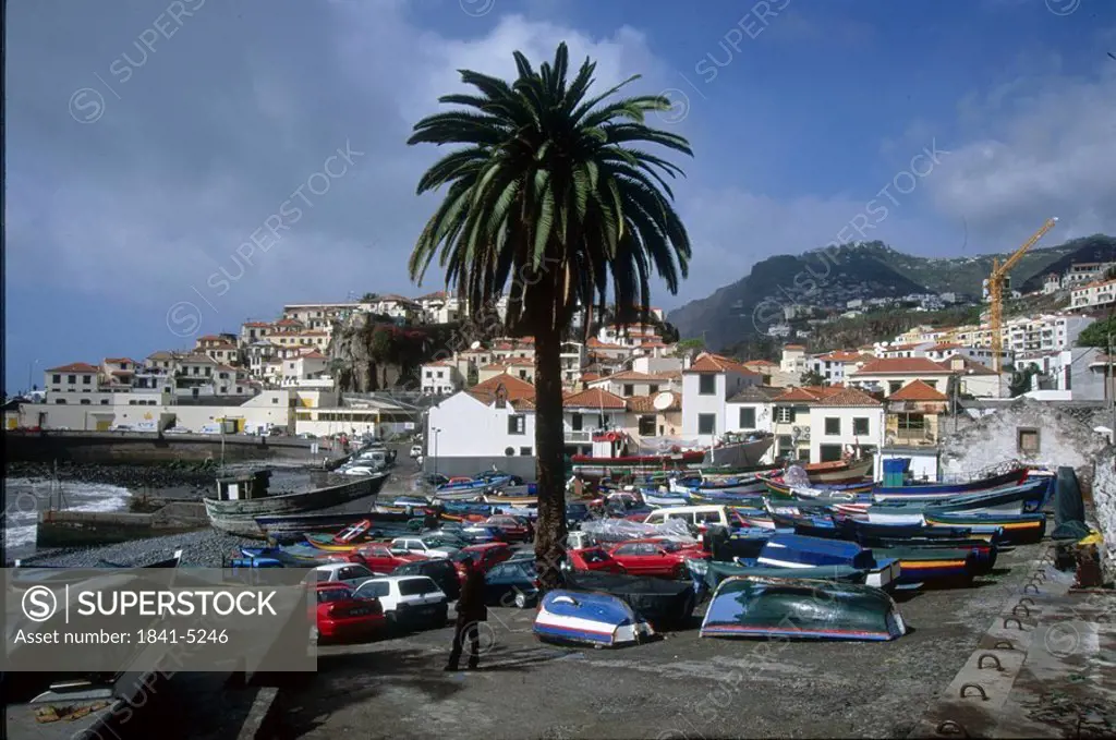 Boats and cars in a parking lot, Camara de Lobos, Madeira, Portugal