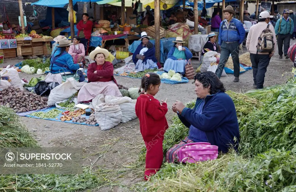 Female vendors in market, Ollantaytambo, Urubamba Province, Cusco Region, Peru
