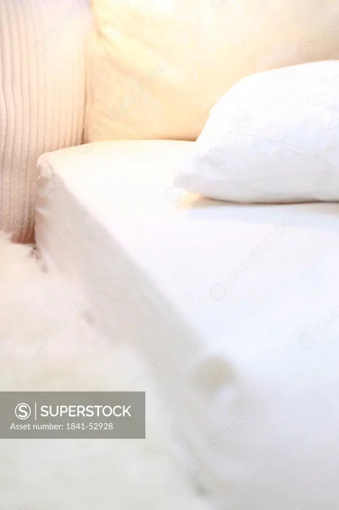 Close_up of pillows on bed