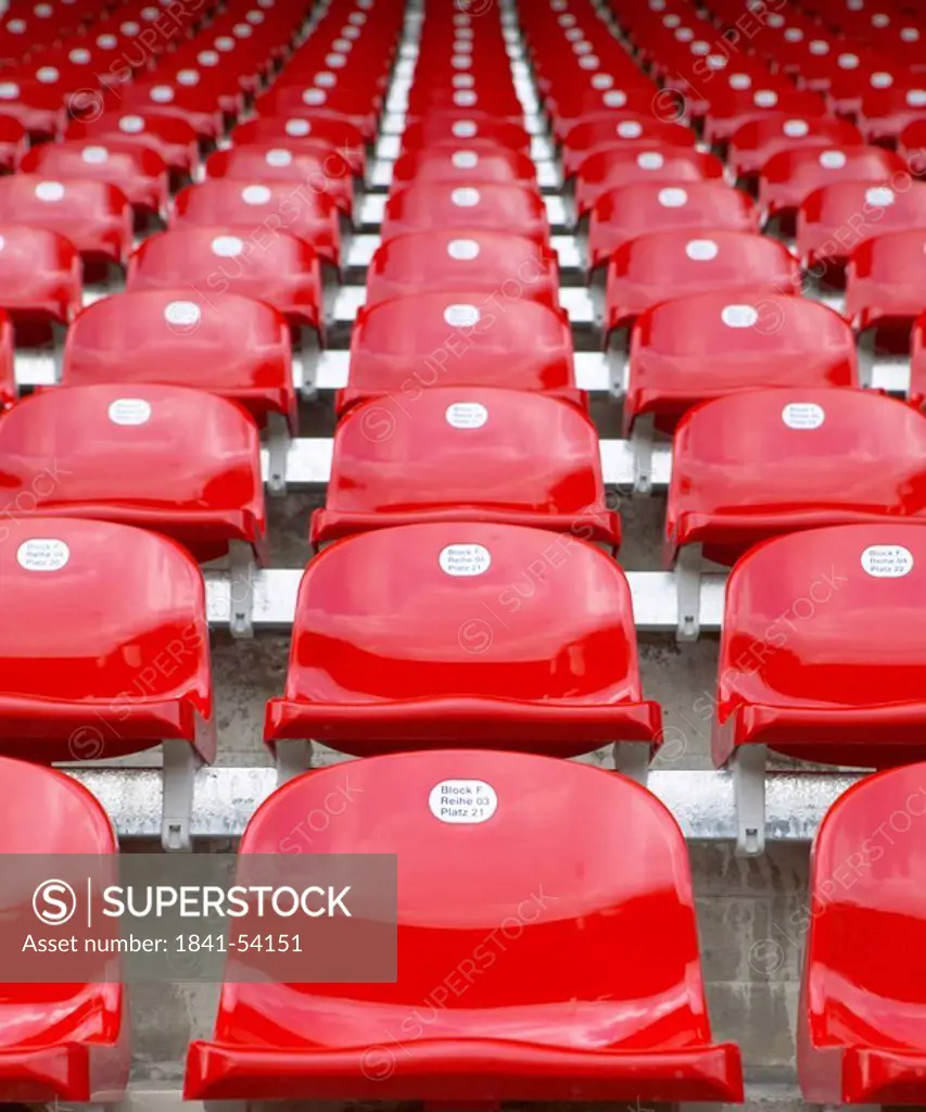 Low angle view of empty chairs at football stadium