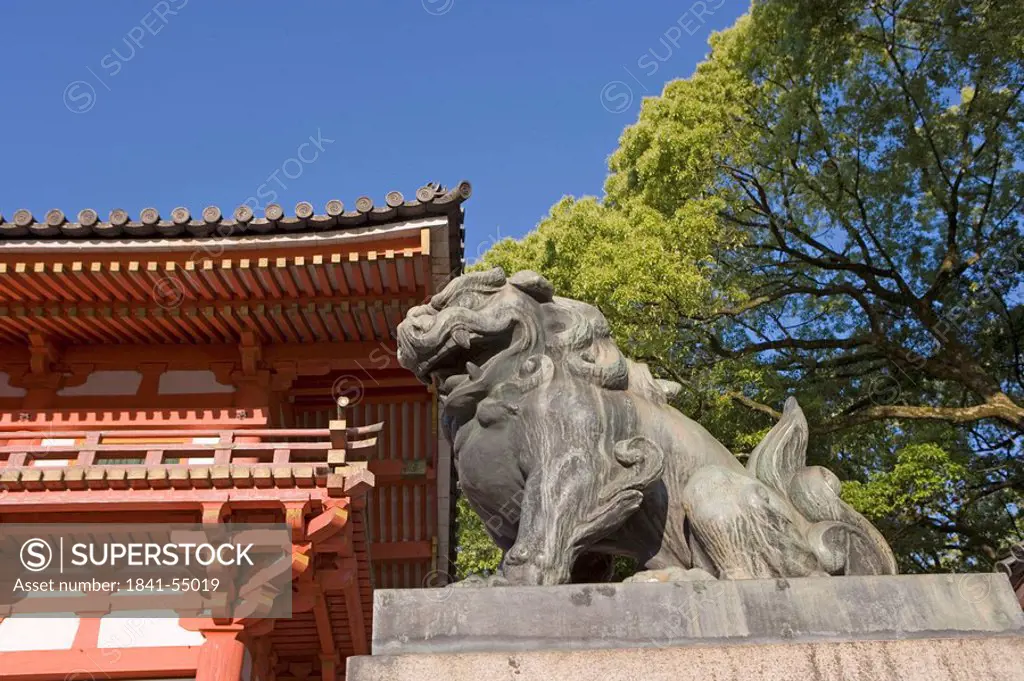 Low angle view of lion´s status in shrine, Yasaka Shrine, Kansai, Kyoto, Japan