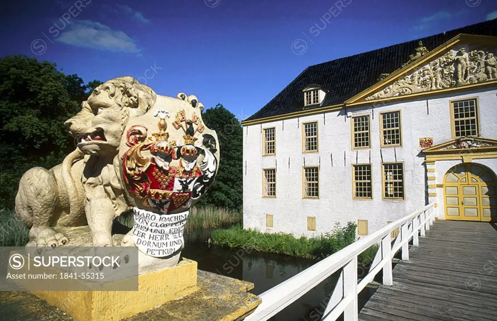 Statue of lion at entrance of castle, Germany