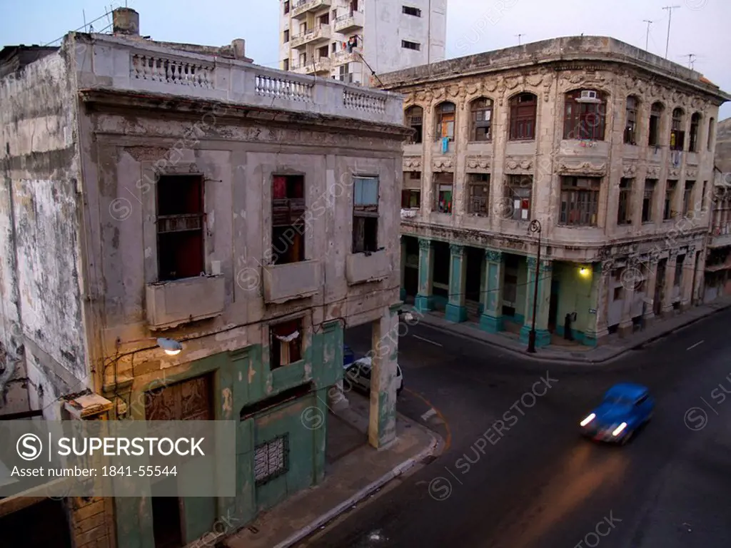 Car traveling in city road, Calle San Lazaro, Havana, Cuba
