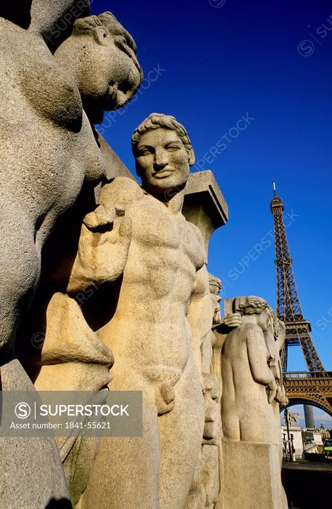 Sculpture in front of tower, Eiffel Tower, Trocadero Fountains, Paris, Ile_de_France, France