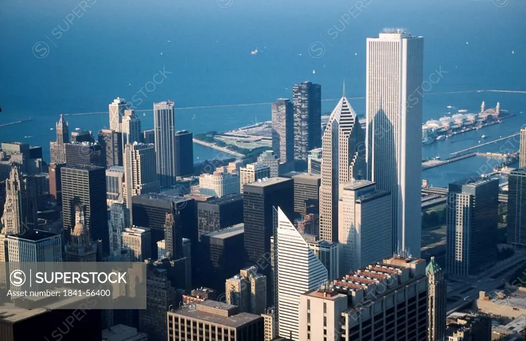 Skyscrapers in city with lake in background viewed from Sears Tower, Amoco Building, Lake Michigan, Chicago, Illinois, USA