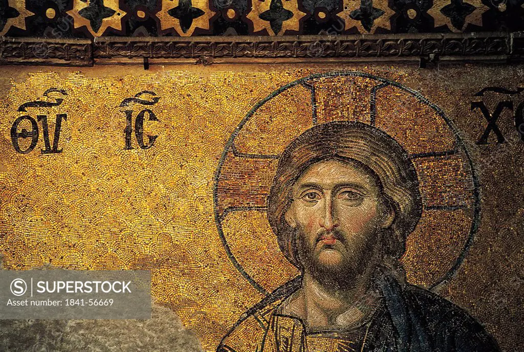 Mosaic tiles of Jesus on wall