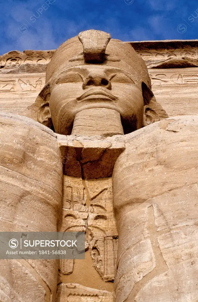 Low angle view of Ramses II statue, Great Temple of Rameses II, Abu Simbel, Egypt