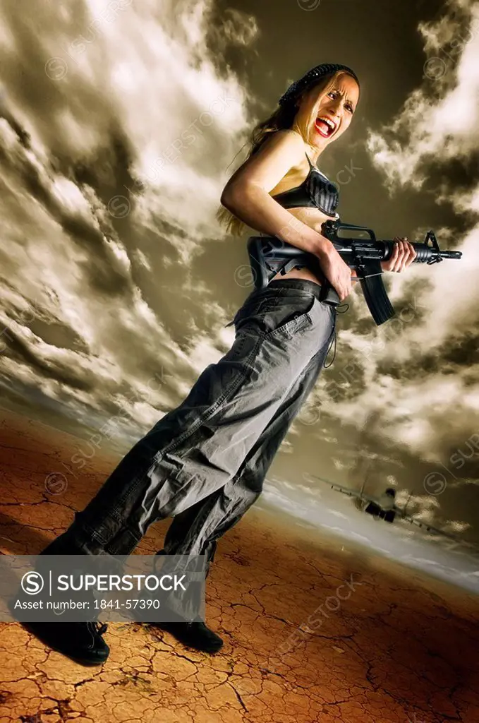 woman with a machine gun, view from below