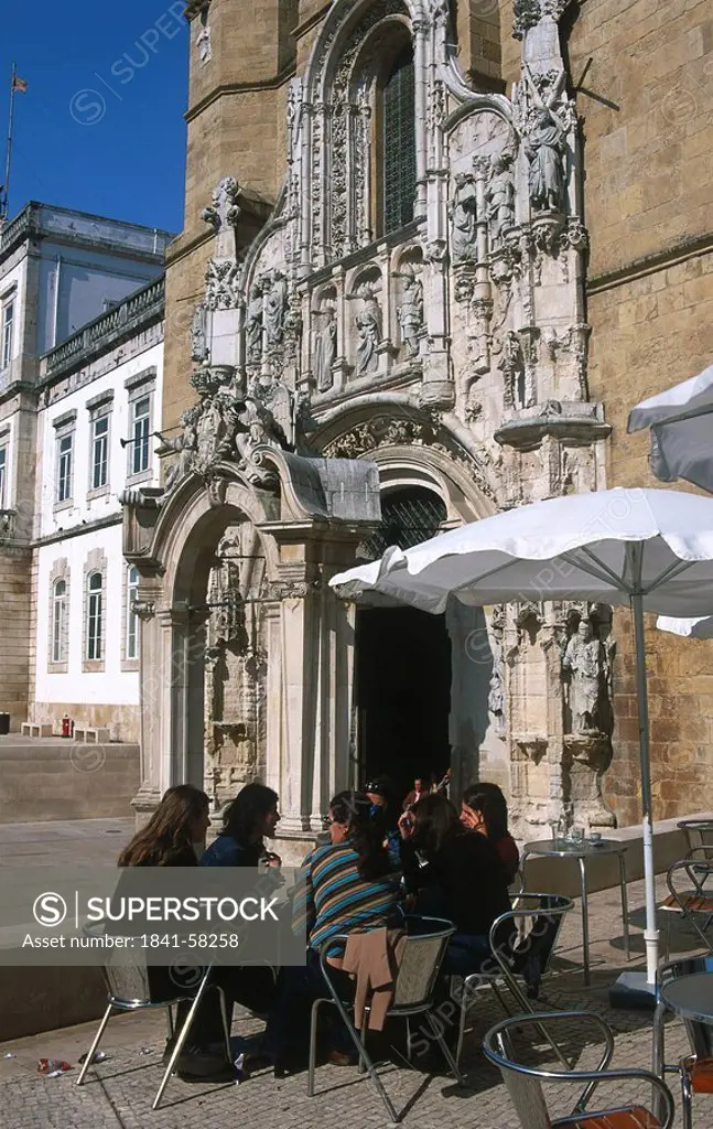 People sitting in front of church, Santa Cruz Monastery, Praca 8 De Maio, Coimbra, Portugal
