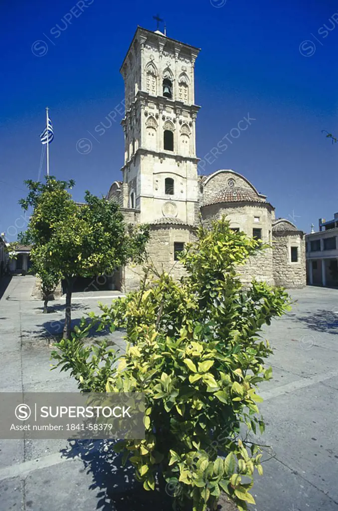 Trees in front of church, St. Lazare Cathedral, Greek Islands, Greece