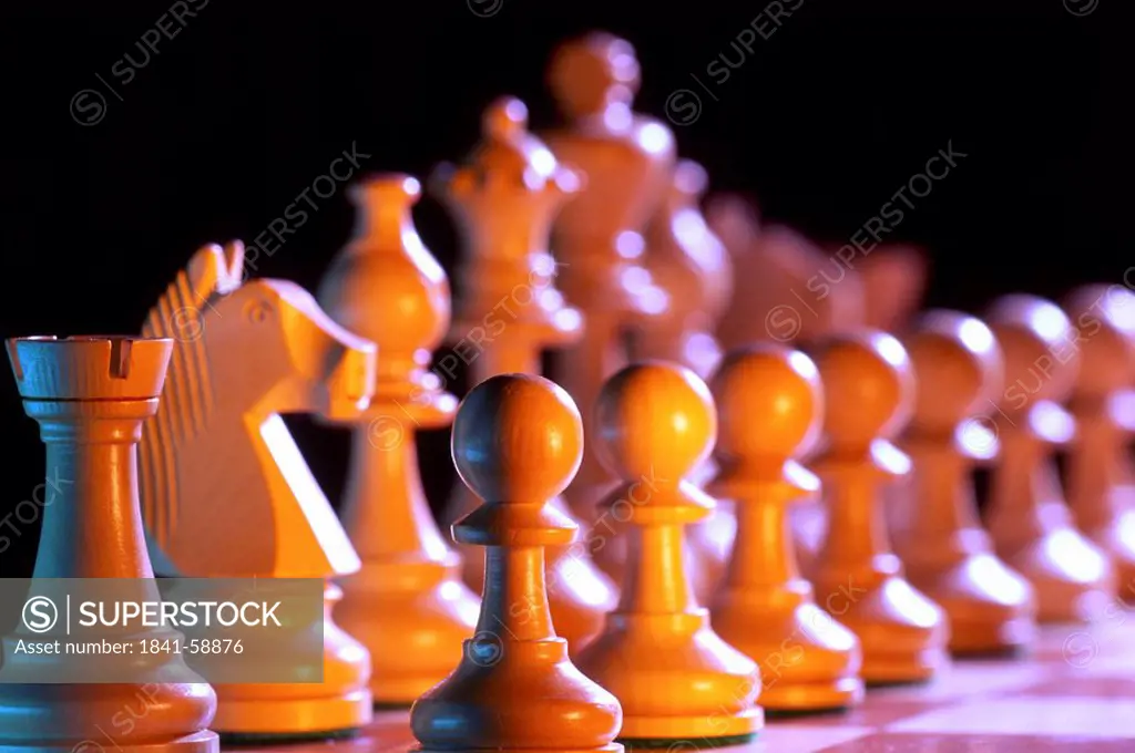 Close_up of chess pieces on chessboard