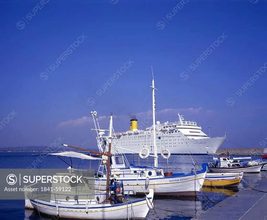 Cruise ship and boats at harbor, Katakolo, Pyrgos, Santorini, Greece