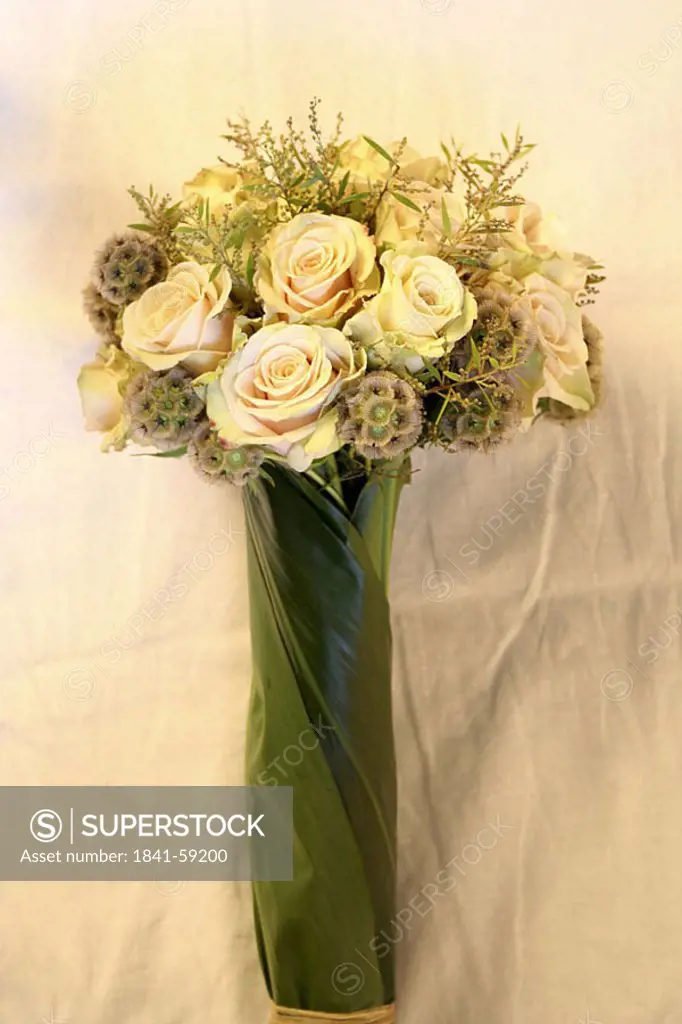 Close_up of bouquet of flowers in vase