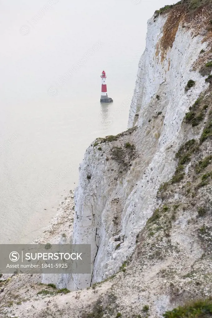High angle view of lighthouse viewed through cliff, Sussex, England