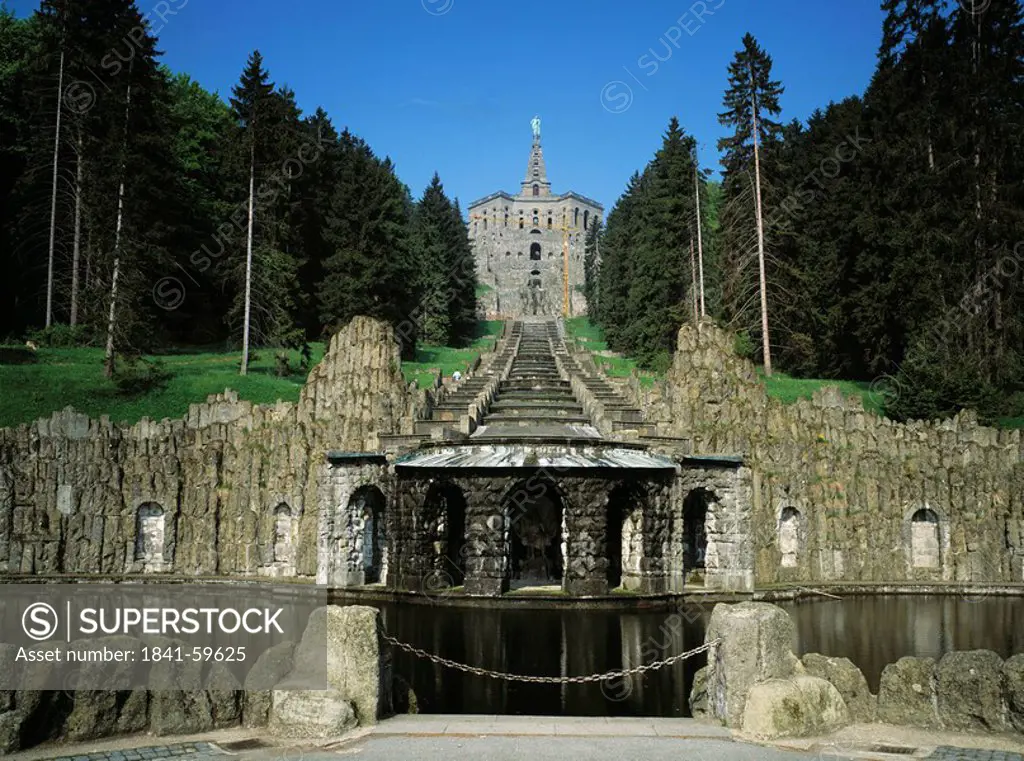 Old monument against blue sky, Herkules Monument, Kassel, Hessia, Germany