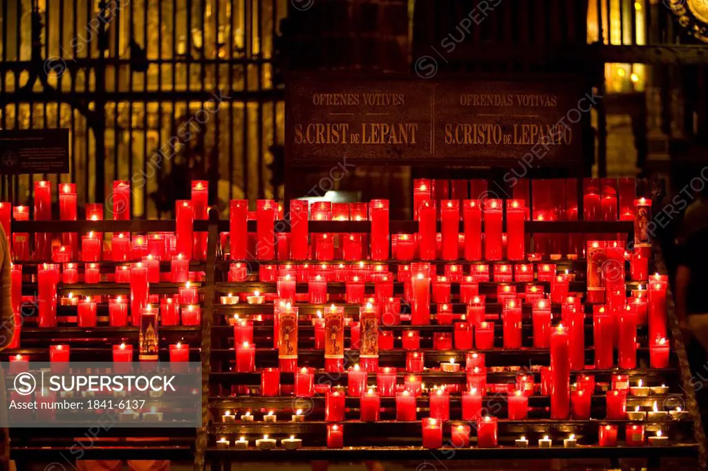 Candles lit up in church, Santa Cruz y Santa Eulalia, Barcelona, Catalonia, Spain