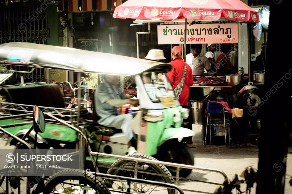 Auto rickshaw in front of a snack bar, Bangkok, Thailand
