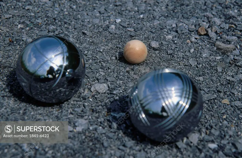 Close_up of Petanque balls on soil