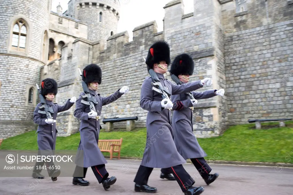 Guards marching in front of castle, Windsor Castle, Windsor, Berkshire, England