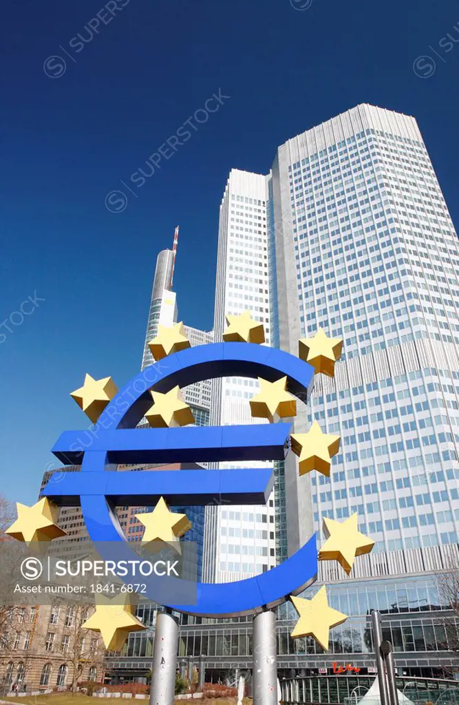 Euro sign and European Central Bank, Frankfurt am Main, Germany, low angle view